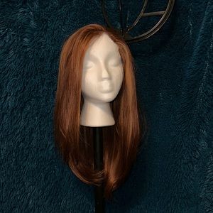 Beautiful red Chelsey Smith cosmetics wig.